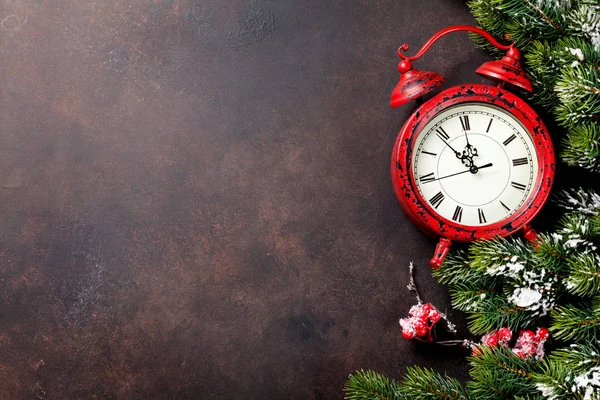 Snow fir tree and alarm clock — Stock Photo, Image