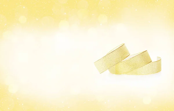 Golden ribbon over christmas background — Stock Photo, Image