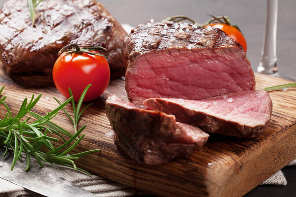 Grilled fillet steak on cutting board
