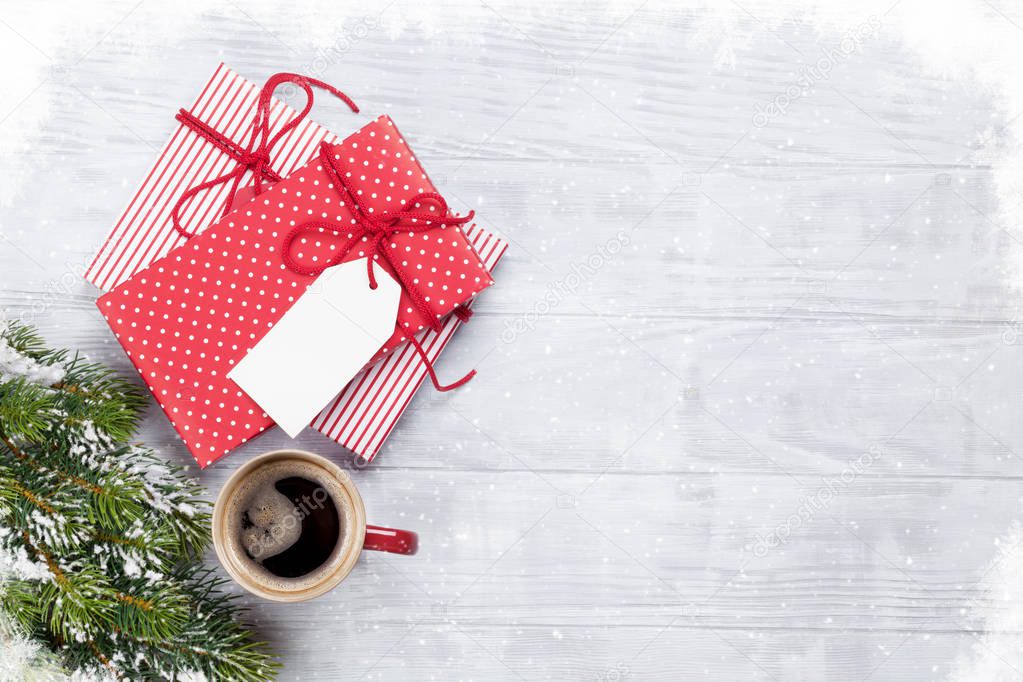 gift boxes, coffee cup and fir tree