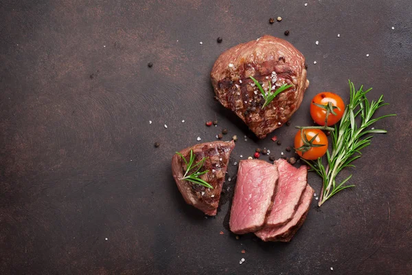 Grilled fillet steaks. Top view with copy space