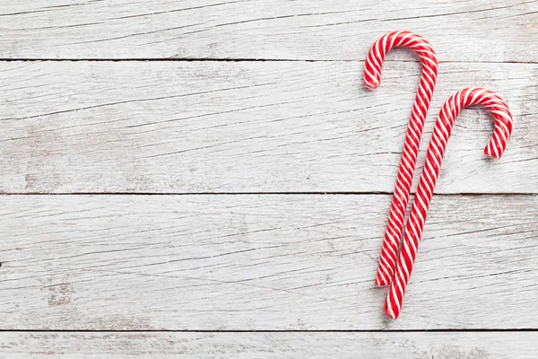 Kerst Candy Canes Houten Tafel Bovenaanzicht Met Ruimte — Stockfoto
