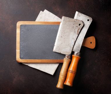 Kasap. Vintage et bıçakları taş kartı. Metin için yer ile Üstten Görünüm