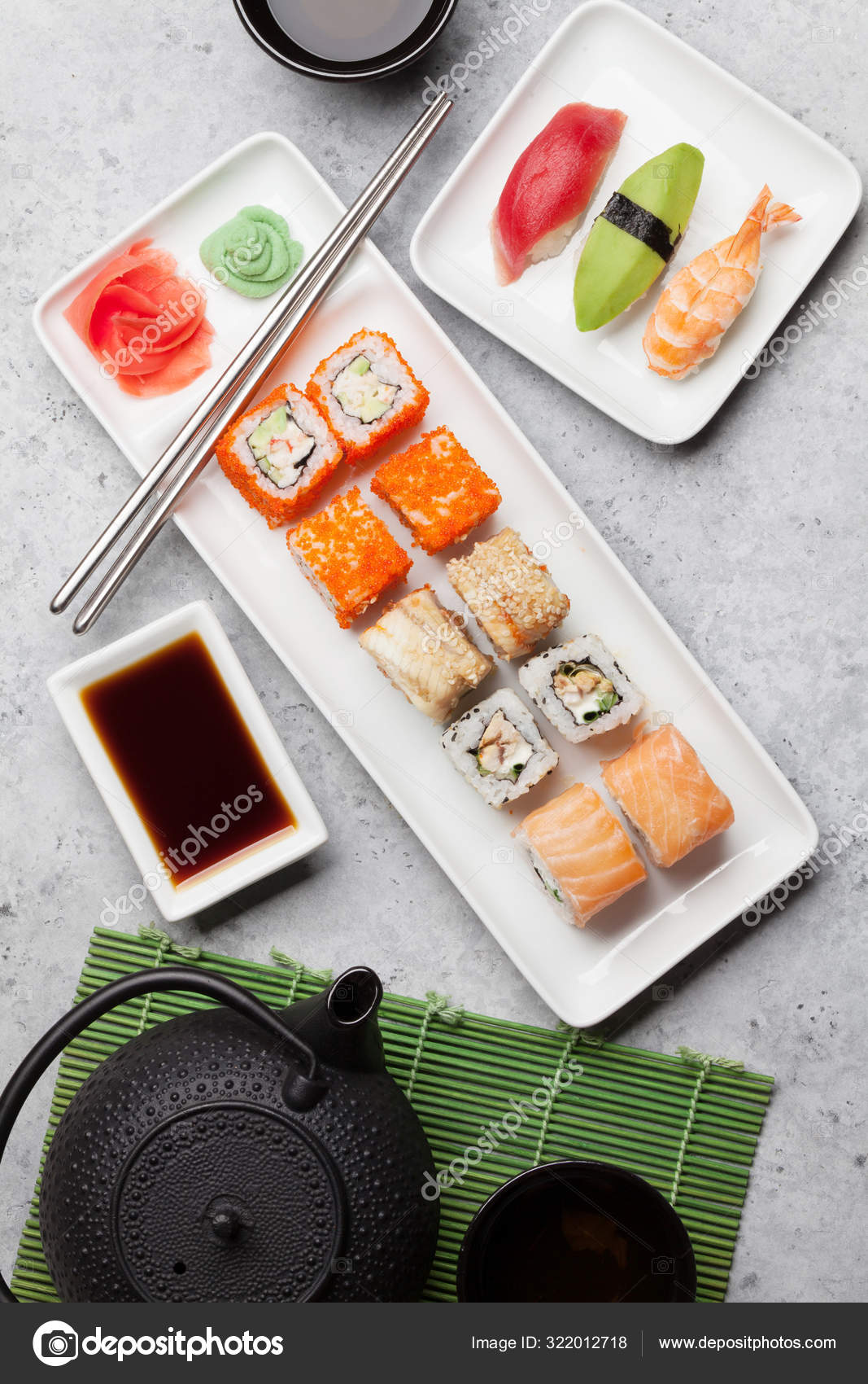 Japanese Sushi Set. Sashimi, Maki Rolls. On Plate Over Stone