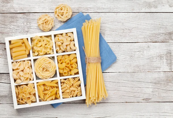 Various Pasta Wooden Box Top View Flat Lay Copy Space — Stock Photo, Image