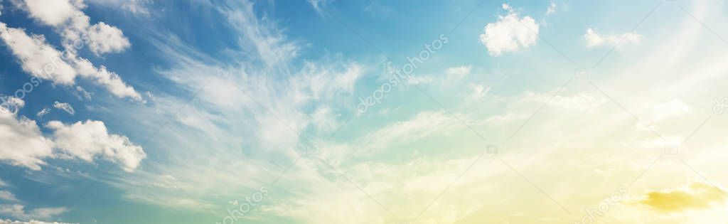 Deep blue sky with scenic clouds. Wide panorama sunset