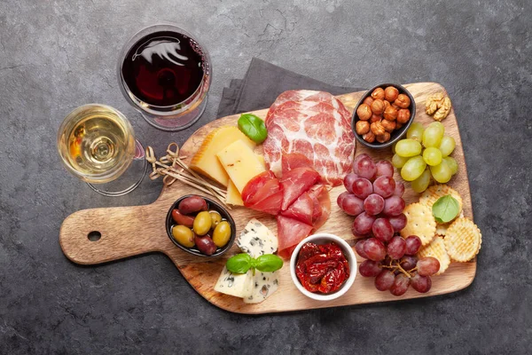 Cheese Meat Grapes Olives Antipasto Appetizer Selection Wooden Board Glasses — Stock Photo, Image