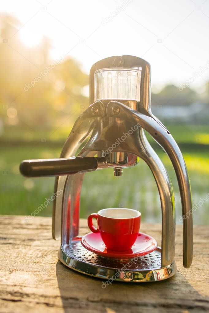 Manual old school espresso maker Stock Photo by ©mazzzur 129952924