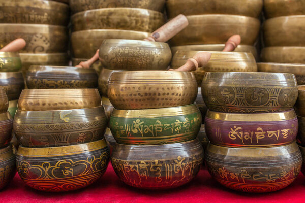 Singing Bowls on red table