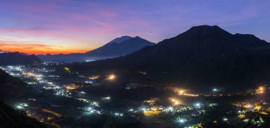 Sunrise over the caldera of Batur volcano  clipart