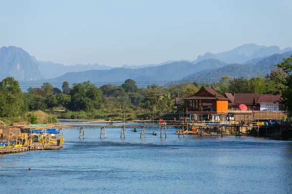 Wooden bridge across Nam Song — Stock Photo, Image