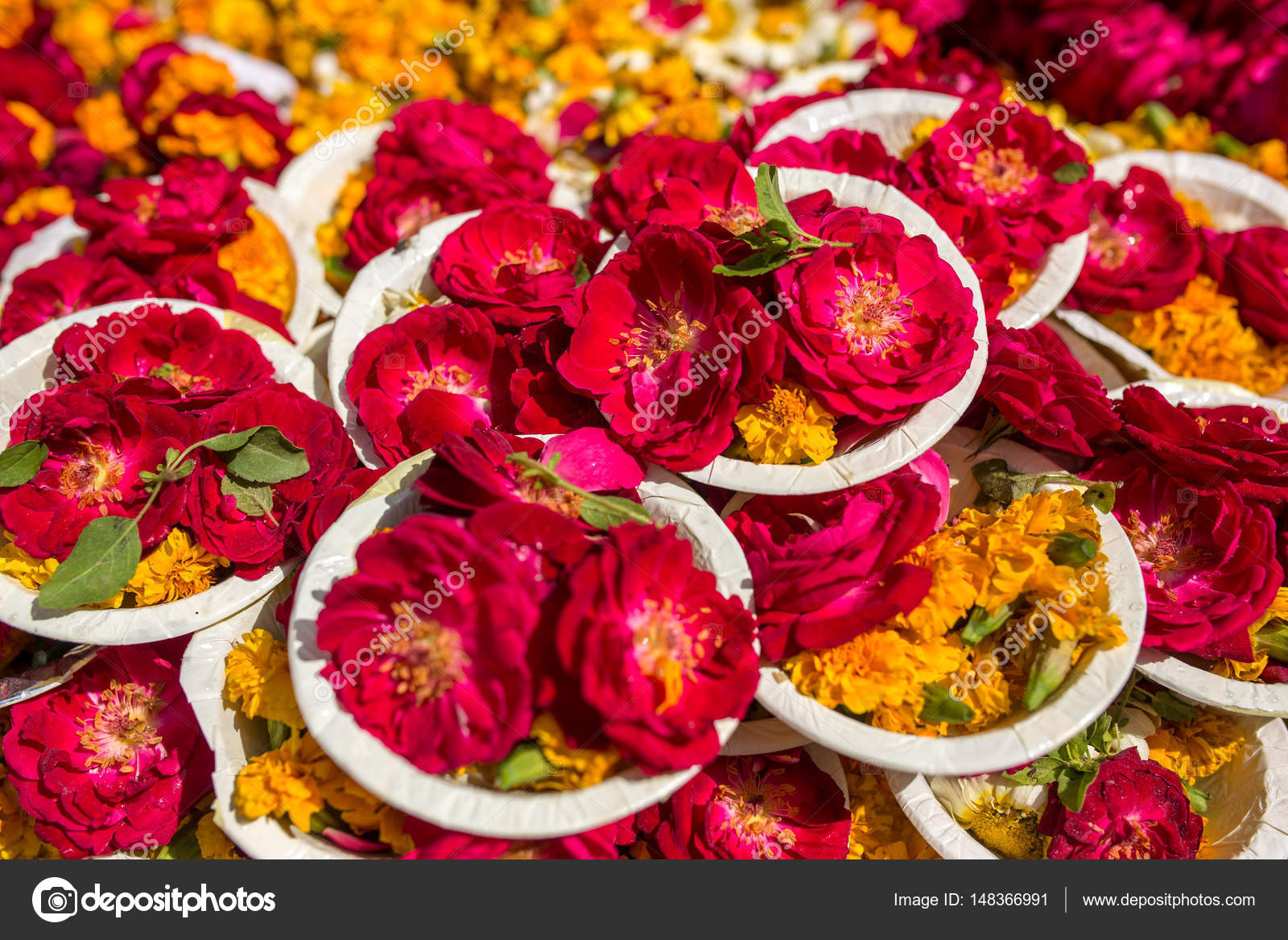 Puja flowers offering Stock Photo by ©mazzzur 148366991