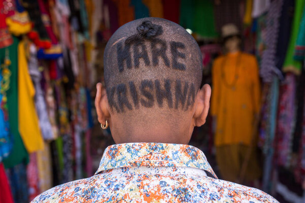  man with a "Hare Krishna" haircut 