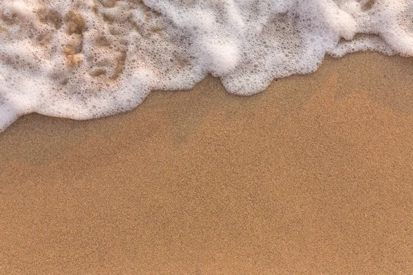 Wave on the sand beach background — Stock Photo, Image