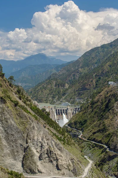 Big hydroelectric power station surrounded by Himalayas mountains in Jammu and Kashmir state, India