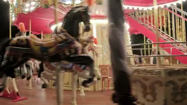 Looped full circle of the vintage carousel carnival fair merry go round close up — Stock Video