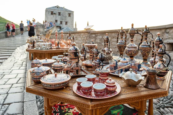 Decorative souvenirs and handicrafts for sale on the Stari Most bridge in Old Town of Mostar BiH — Stock Fotó