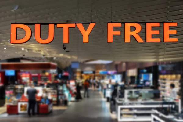 Duty Free zakupy, Streszczenie rozmycia centrum handlowego i domu towarowego na lotnisku. — Zdjęcie stockowe