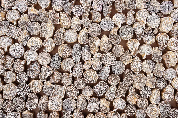 Wooden stamps printing blocks hand carved for sale on the street market in India. — Stock Photo, Image