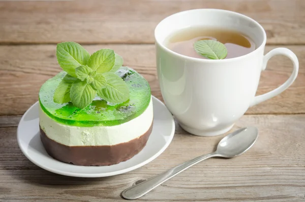 Herbal tea with cake on wooden background. horizontal position — Stock Photo, Image