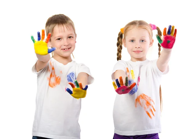 Beautiful little girl with boy and their hands in the paint Royalty Free Stock Images