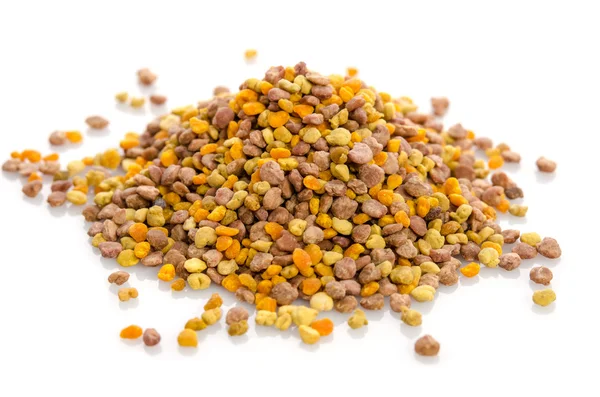 Bee pollen granules isolated on white — Stock Photo, Image
