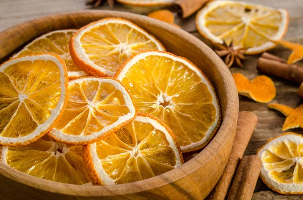 Full bowl with dry orange and spices — Stock Photo, Image