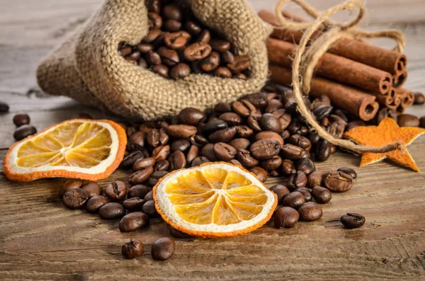 Bag with coffee beans and Christmas attributes — Stock Photo, Image