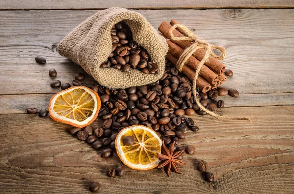 Bag with coffee beans and Christmas attributes — Stock Photo, Image