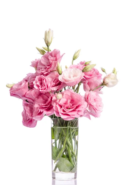 Różowe kwiaty eustoma w szklanym wazonie — Zdjęcie stockowe