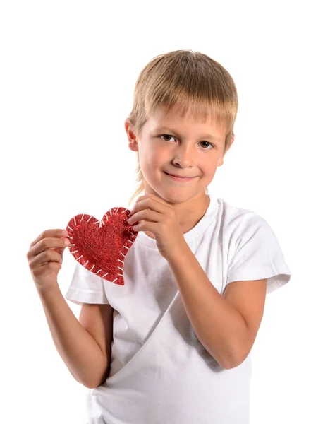 Cute boy holding a red heart (valentine) isolated on white backg — Stock Photo, Image