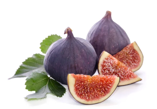 Ripe figs with leaves over white — Stock Photo, Image