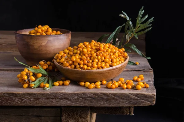 Sea buckthorn  on wooden table — Stock Photo, Image