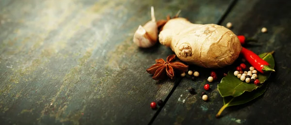 Various Spices on rustic background — Stock Photo, Image