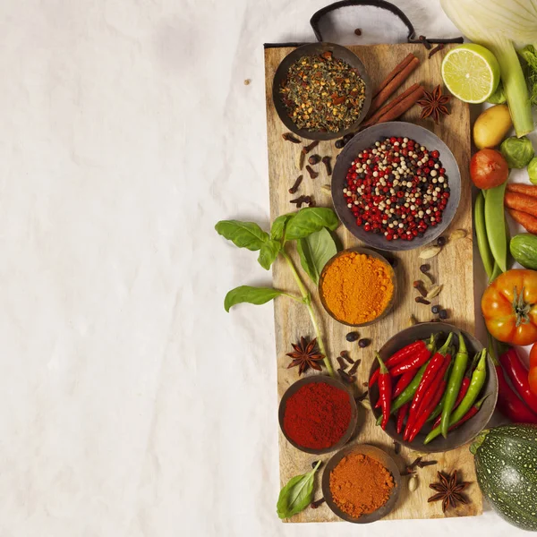 Different spices in bowls on table — Stock Photo, Image