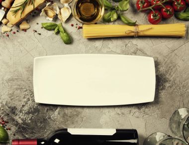 Italian food background. Slate background with space for text clipart