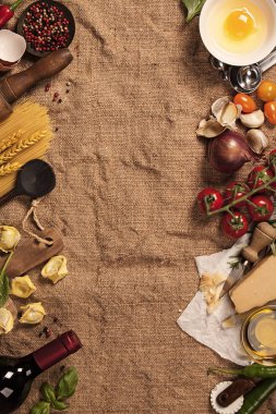 Italian food background. Burlap background with space for text clipart