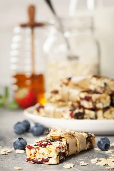 Granola bar on a grey rustic table — Stock Photo, Image