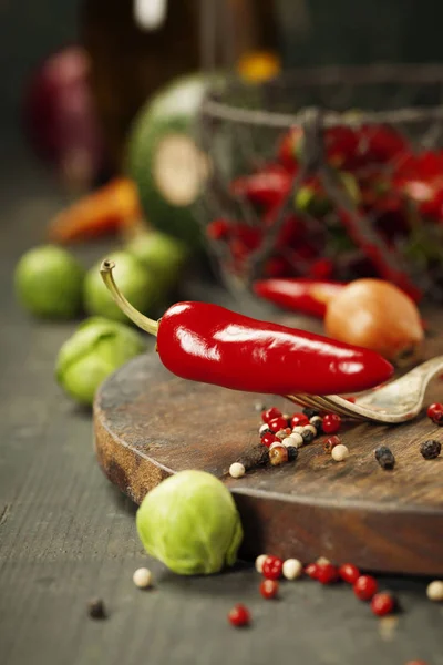 Hot red pepper and ingredients for cooking — Stock Photo, Image