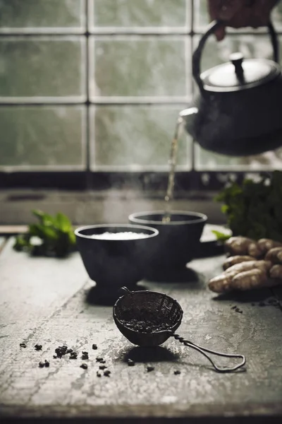 Tea composition on dark rustic background — Stock Photo, Image