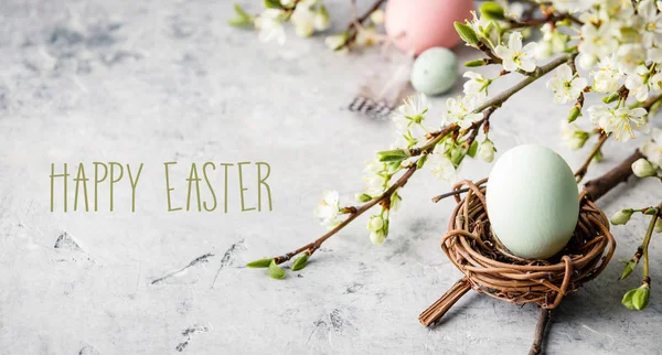 Easter composition on grey concrete backgrount — Stock Photo, Image