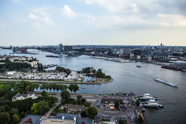 Amsterdam stadsbild och vacker solnedgång — Stockfoto