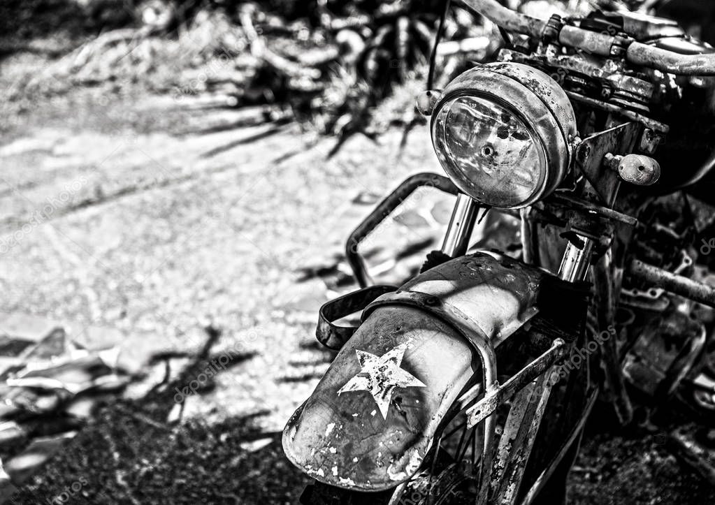 Ancient military motorcycle in the rainforest.