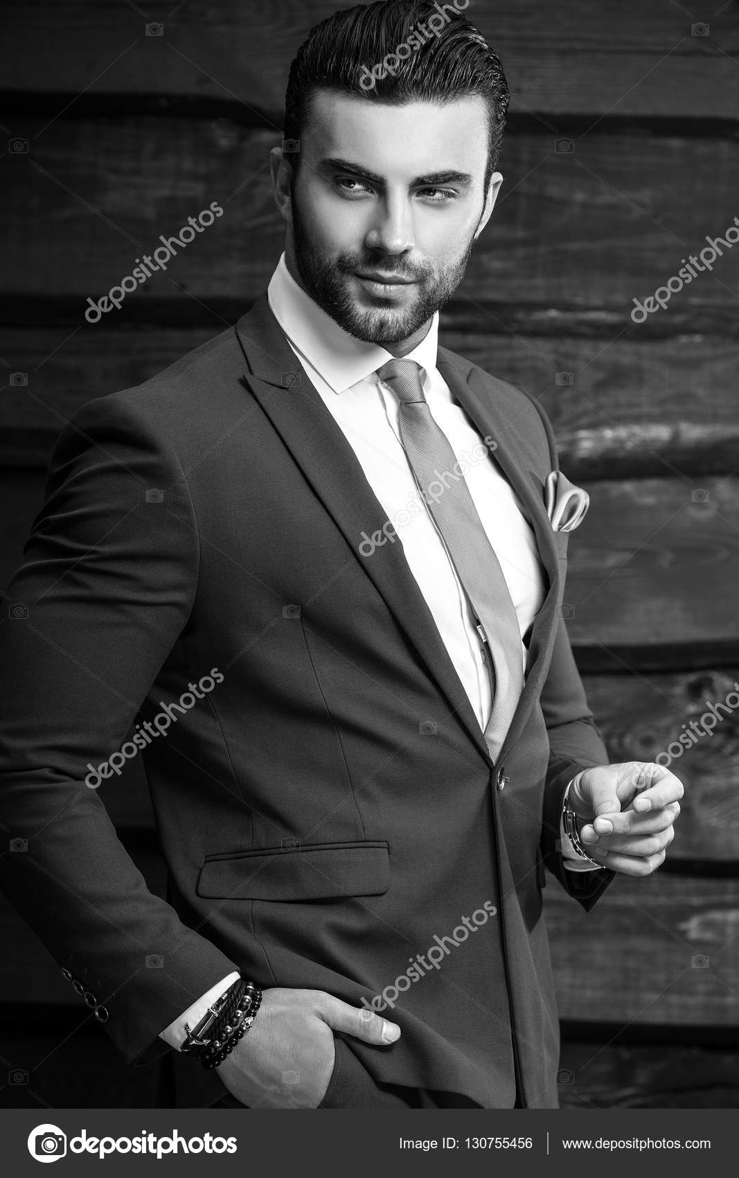 Black-white portrait of beautiful fashionable man in stylish suit ...