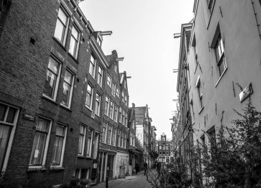 Amsterdam, Hollanda - 10 Ocak 2017: Amsterdam city sun set adlı ünlü vintage binalar. Genel peyzaj bakışta geleneği Hollandalı arcitecture. 10 Ocak 2017 - Amsterdam - Hollanda