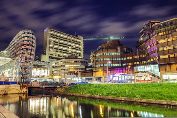 NETHERLANDS, UTRECHT - May 27, 2017: Streets and buildings of the ancient European city of Utrecht at night time, Netherlands — стоковое фото