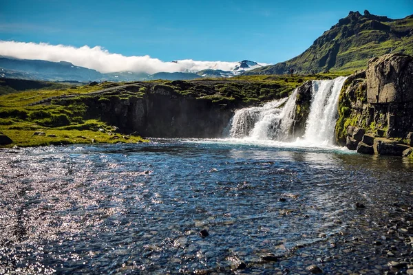 Picturesque landscape of a mountain waterfall and traditional nature of Iceland. — Stock Photo, Image