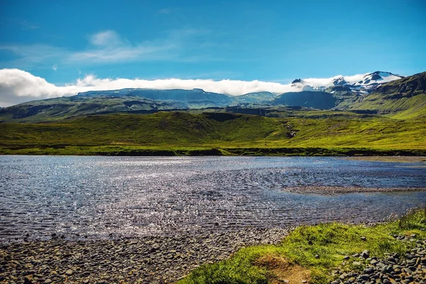 Picturesque landscape of a mountain river with traditional nature of Iceland.