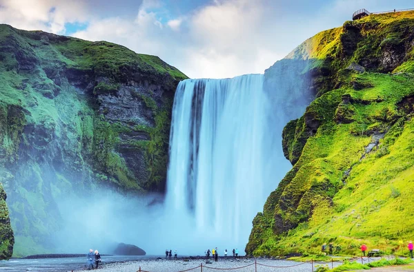 Picturesque landscape of a mountain waterfall and traditional na — Stock Photo, Image