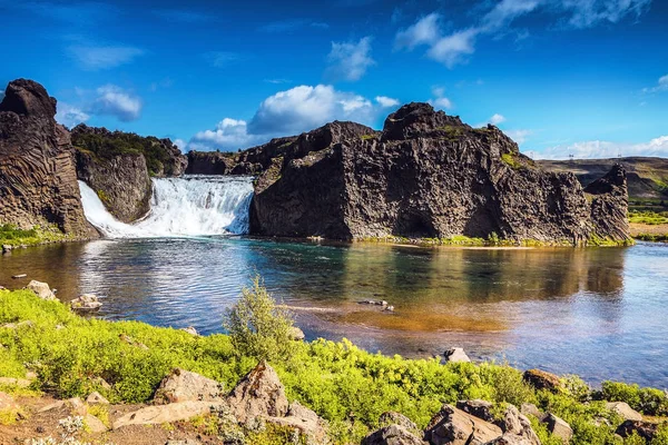 Picturesque landscape of a mountain waterfall and traditional na — Stock Photo, Image